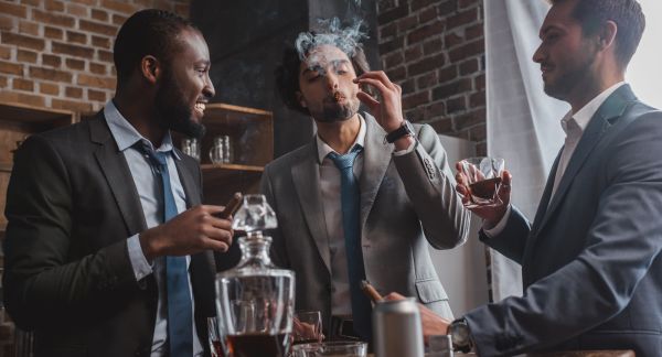 Three Men Smoking Cigars and Drinking Whiskey