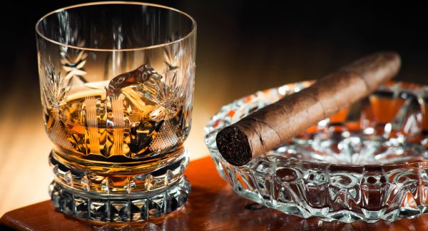 Unlit Cigar with Whiskey Glass